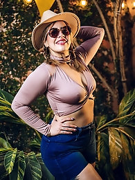 Leaning on the edge of the pool.