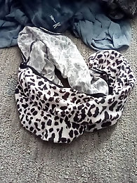 Stretching a leopard print underwear.. .