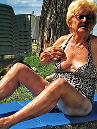 Mature damsel is taking off her panties